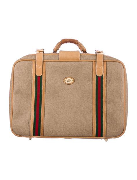 gucci suit case|Gucci suitcase price.